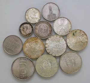 Lotto di 12 monete in argento come da foto. ... 