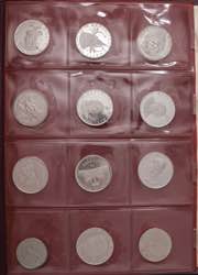 Collezione di 51 monete in argento in album ... 