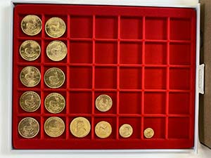 15 Goldmünzen Südafrika. Dabei ... 