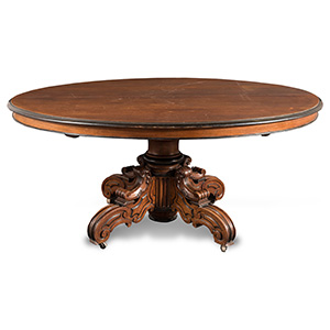 Walnut oval dining table, ebonized profiles, ... 