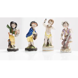 Four polychrome porcelain figurines.