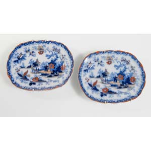 Pair of oval blue and red ceramic dishes, ... 