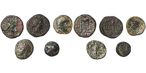   Lot with 5 Ae coins to identify.