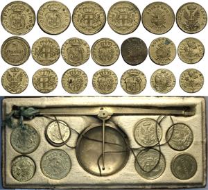 Bilancia da mercante con 20 pesi monetali ... 