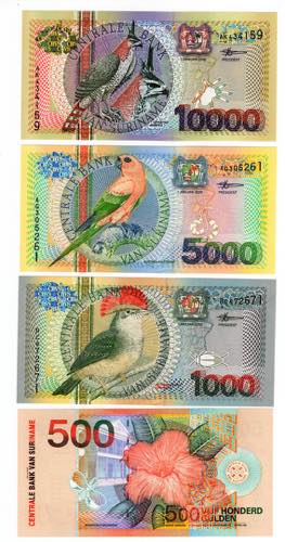 Suriname - lotto di 4 banconote ... 