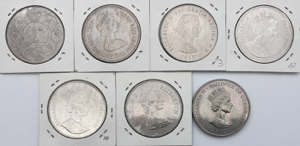 Lotto di 7 monete mondiali di grande modulo.