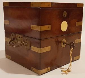 Wooden box with brass decorations, side ... 