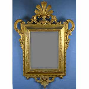 Specchiera di linea Luigi XV in legno dorato ... 