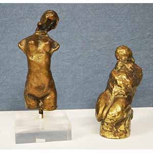 Due sculture in bronzo dorato raff.ti ... 