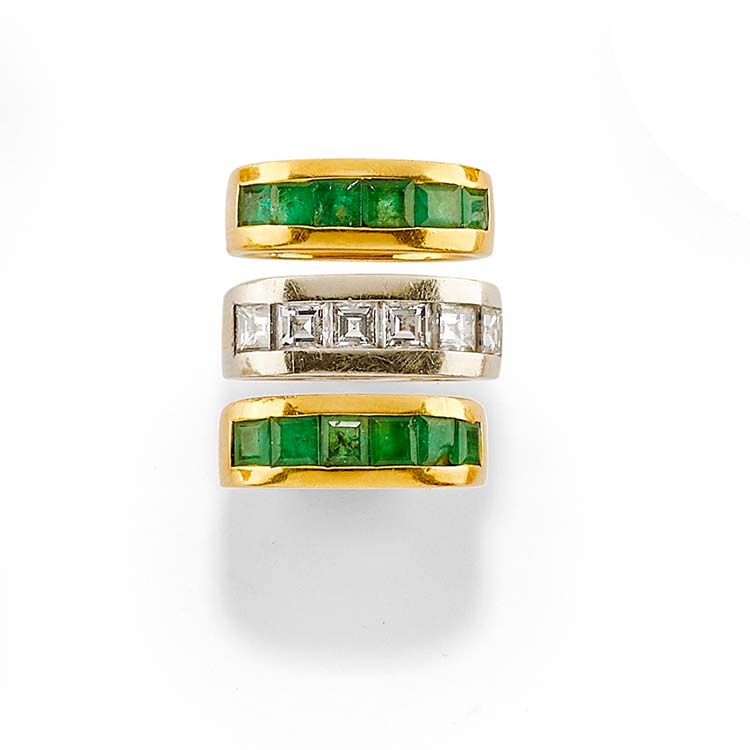 A 18K two-color gold, emerald and ... 