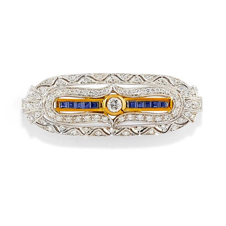 A 18K two-color gold, diamond and ... 