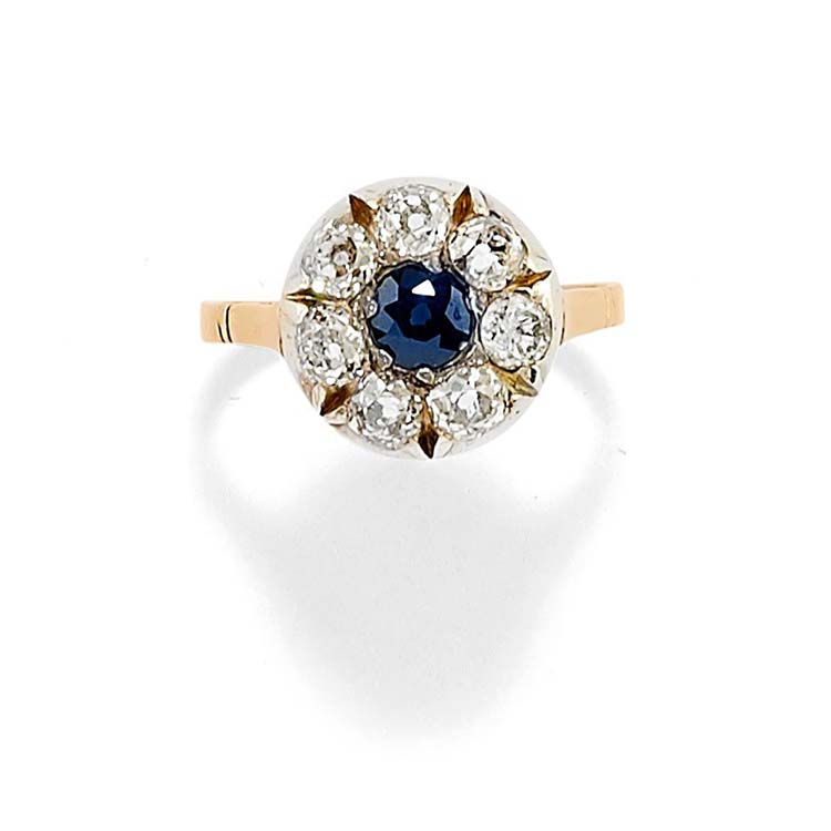 A 18K two-color gold, sapphire and ... 