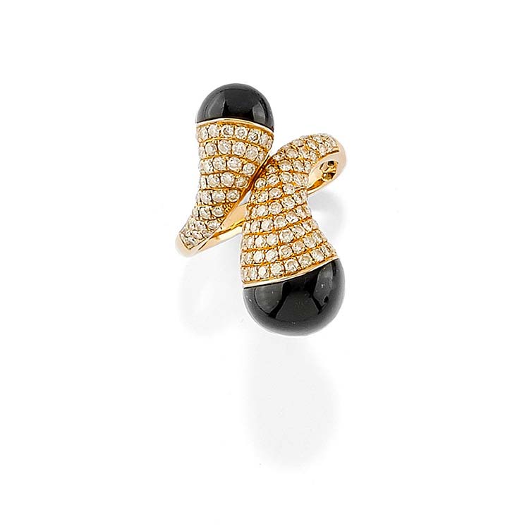 A 18K yellow gold, onyx and ... 