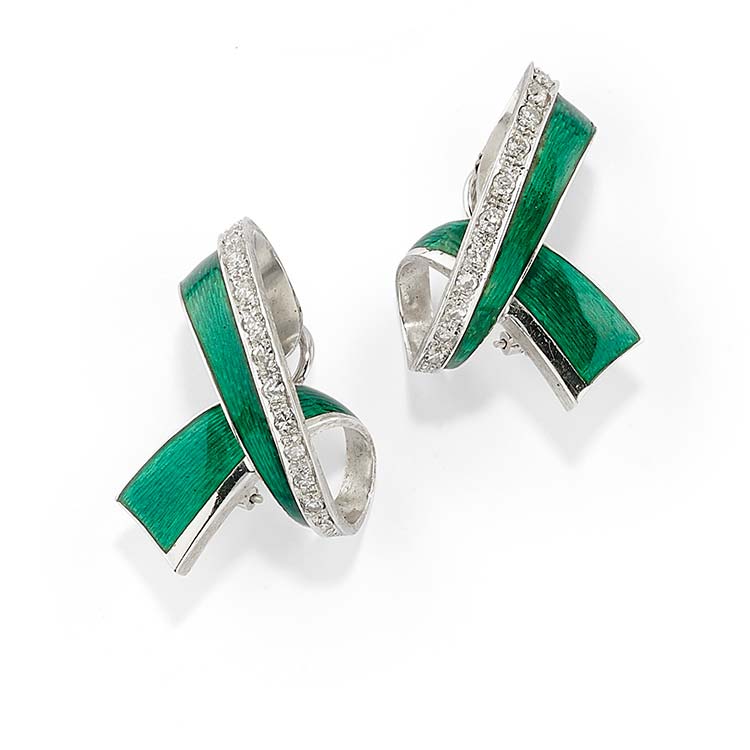 A 18K white gold, green enamel and ... 
