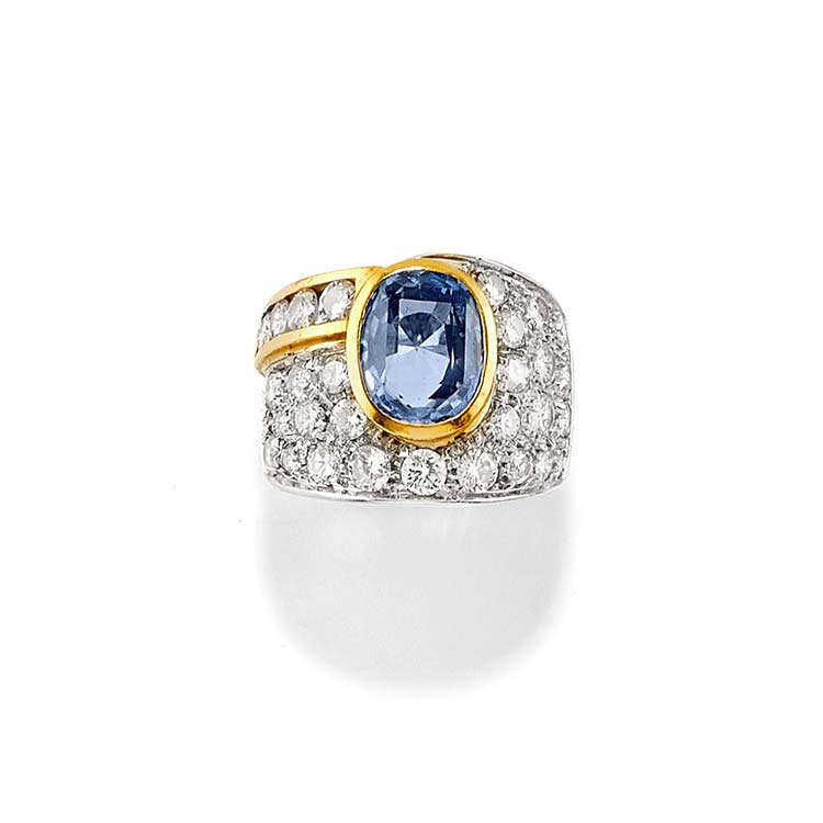 A 18K two-color gold, sapphire and ... 