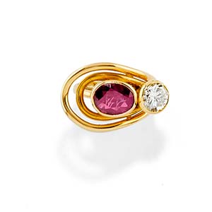 A 18K yellow gold, diamond and ruby ... 
