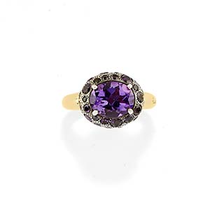 A silver, 18K yellow gold and amethyst ring, ... 