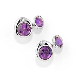 A 18K white gold, amethyst and diamond ... 