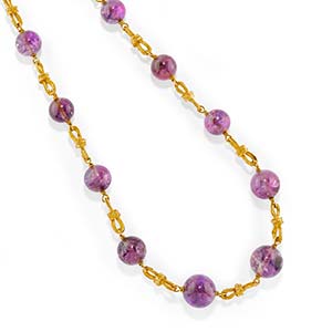 A 18K yellow gold and amethyst ... 