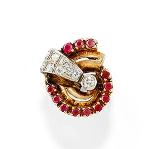 A 14K yellow gold, silver, ruby and diamond ... 