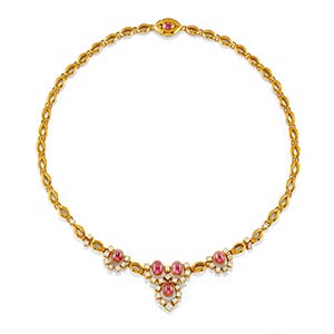 A 18K yellow gold, ruby and diamond demi ... 