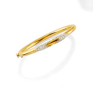 A 18K two-color gold and diamond ... 