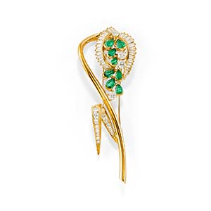 A 18K yellow gold, diamond and emerald ... 