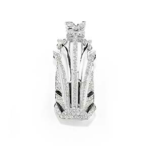A 18K white gold, onyx and diamond pendant ... 