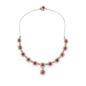 A 18K white gold, ruby and diamond ... 