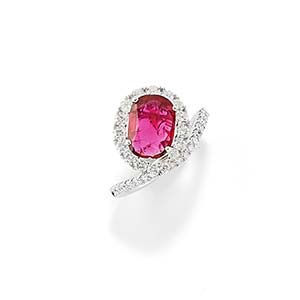 A 18K white gold, ruby and diamond ring, ... 