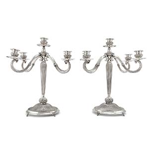 A couple of silver candelabra, Florence 20th ... 