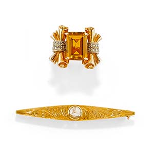 A silver, low-carat gold, 18K yellow gold, ... 