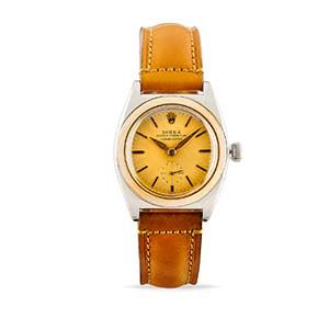 A stainless steel and gold wristwatch, ... 