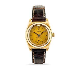 A 18K yellow gold wristwatch, RolexWeight g ... 