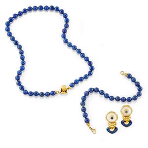 A 18K yellow gold, lapislazuli and mother-of ... 