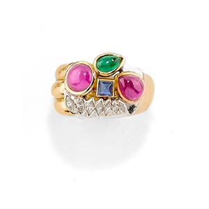 A 18K two-color gold, ruby, emerald, ... 