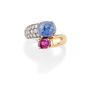 A 18K two-color gold, sapphire and diamond ... 