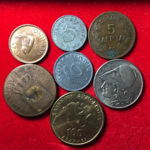 World coins. Lotto di 7 monete mondiali.
