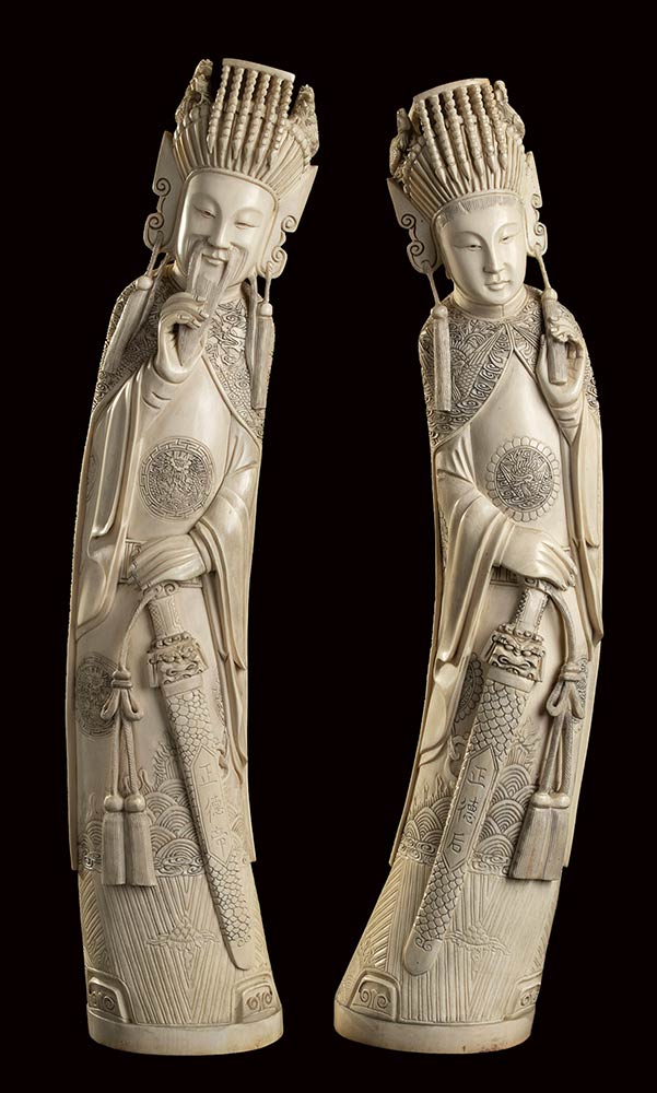 A PAIR OF LARGE IVORY CARVINGS OF STANDING Bertolami Fine Art