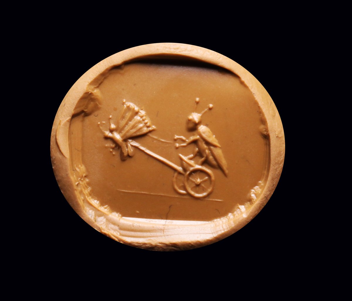 A ROMAN CARNELIAN INTAGLIO. GRASSHOPPER DRIVING A ... - Bertolami Fine Art
