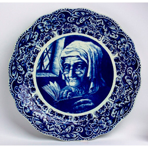 Large blue ceramic plat depicting ... 
