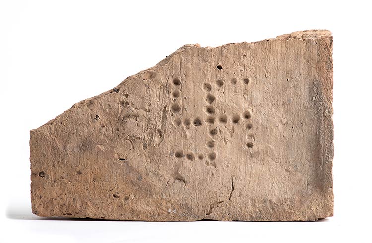 Roman brick stamp with swastika, ... 