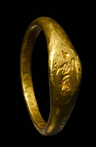 A small roman signet gold ring ... 