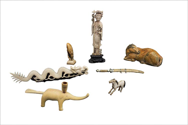 SIX IVORY CARVINGS AND A MINIATURE ... 