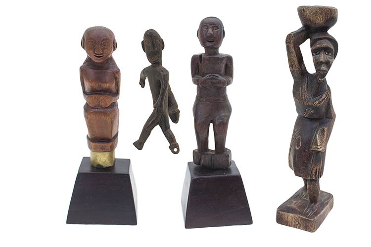 FOUR SMALL INDONESIAN CARVED WOOD ... 