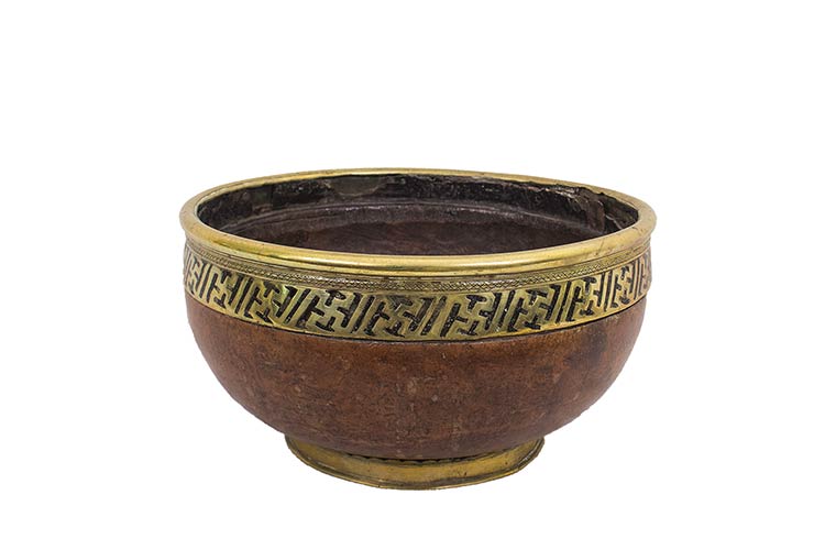 A LARGE WOODEN BOWL WITH BRASS ... 