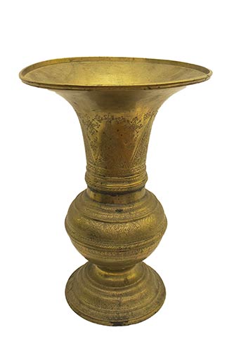AN INDONESIAN INCISED BRASS ... 
