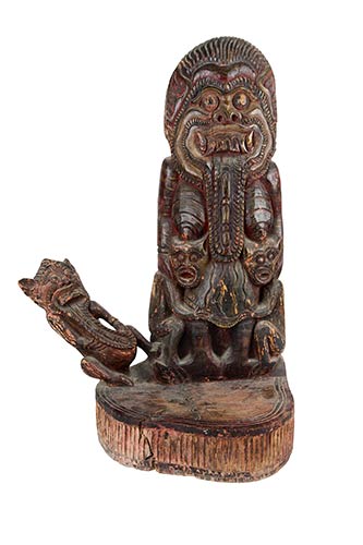 A BALINESE CARVED WOOD SCULPTURE ... 