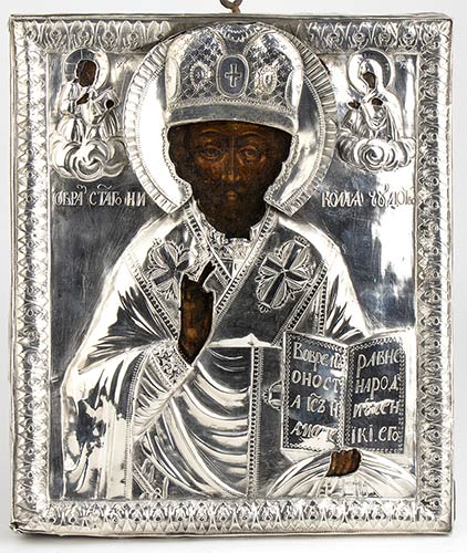 A Russian Icon with silver oklad ... 