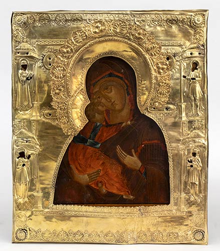 A Russian Icon with silver oklad ... 